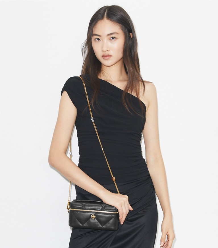 Tory Burch designer mini bags Portagioie Kira East-West con trapuntatura a diamante e ciondolo in Black angle