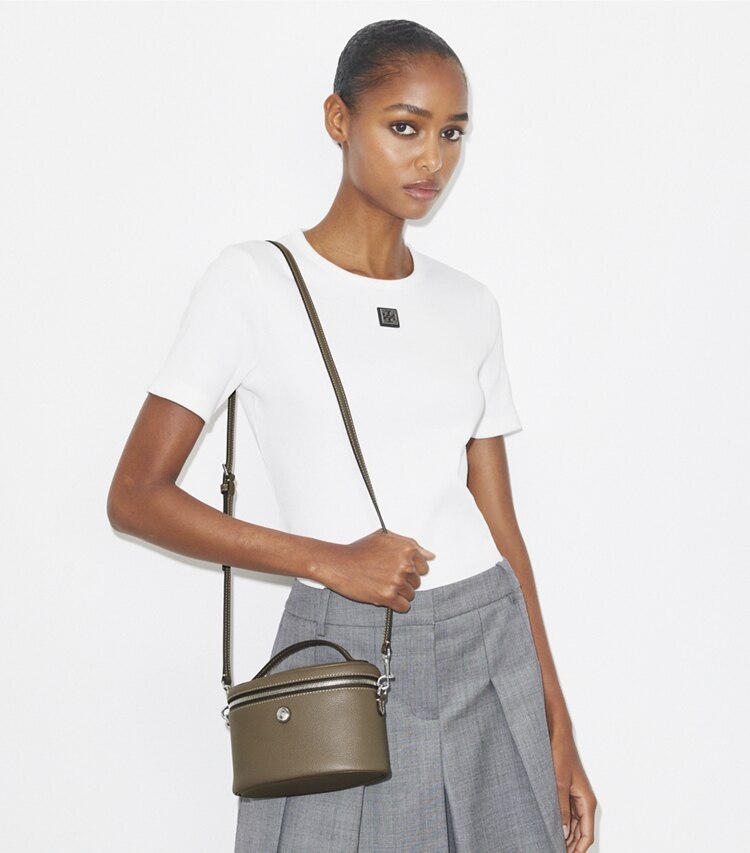 Tory Burch designer mini bags Portagioie morbido con superficie martellata in Wild Mushroom accessory on model