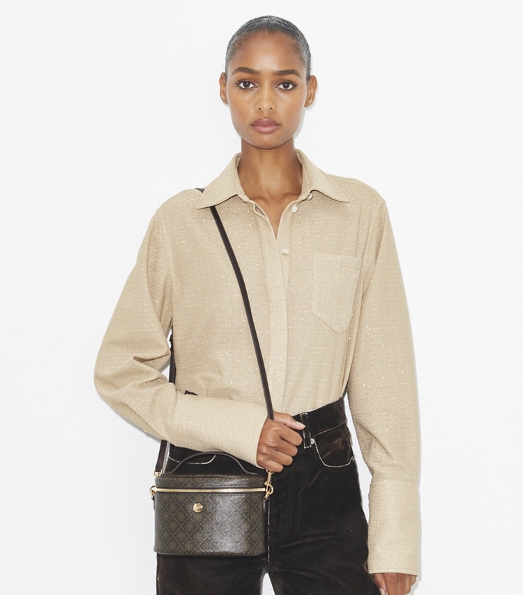 Tory Burch designer mini bags Portagioie morbido in tela rivestita T Monogram in French Press accessory on model