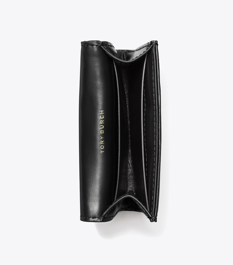 Tory Burch designer portes-cartes Porte-cartes à rabat matelassé diamant Kira dans Black vue du dessus