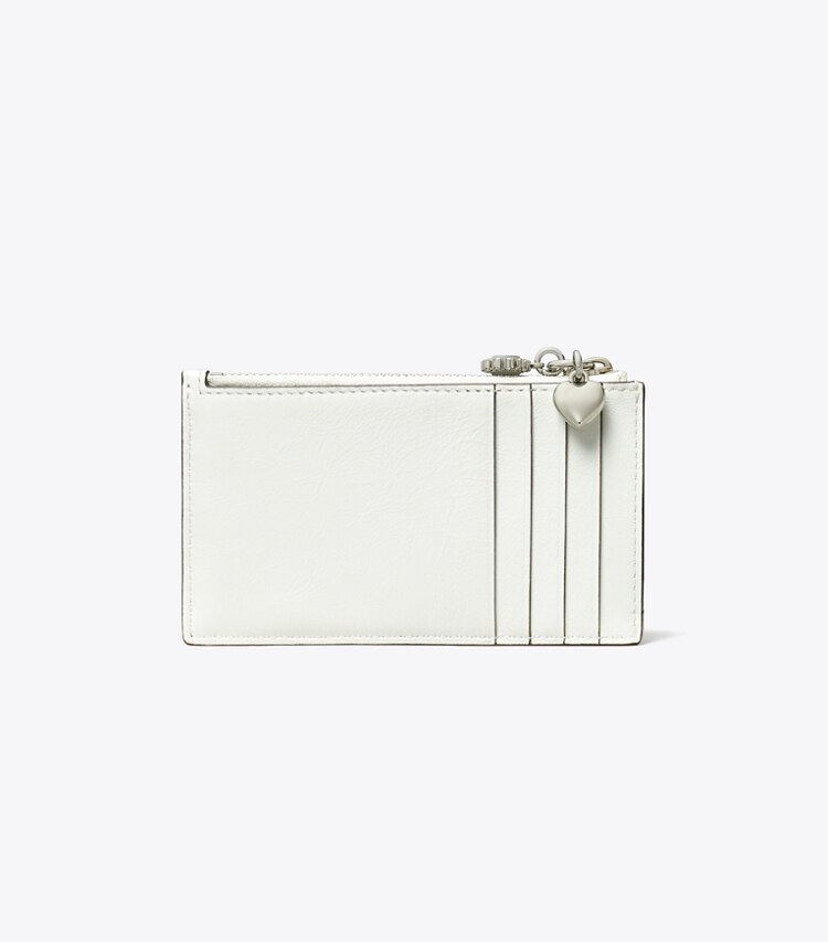Tory Burch designer portes-cartes Porte-cartes zippé Kira matelassé diamant avec breloque aspect vieilli dans Blanc retour