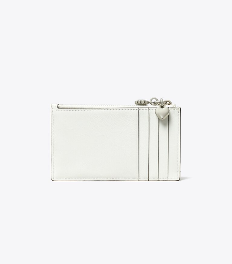 Tory Burch designer portes-cartes Porte-cartes zippé Kira matelassé diamant avec breloque aspect vieilli dans Blanc retour