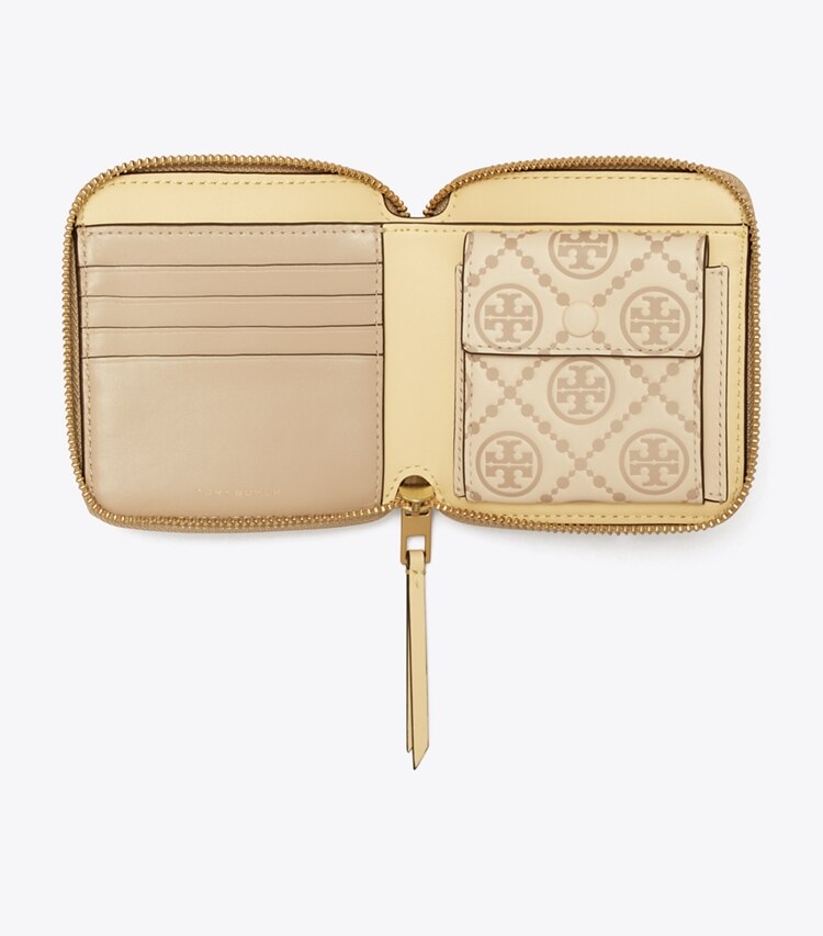 Tory Burch designer portefeuilles Portefeuille à deux volets T Monogram embossé contrastant dans LONGAN / NEW CREAM vue du dessus