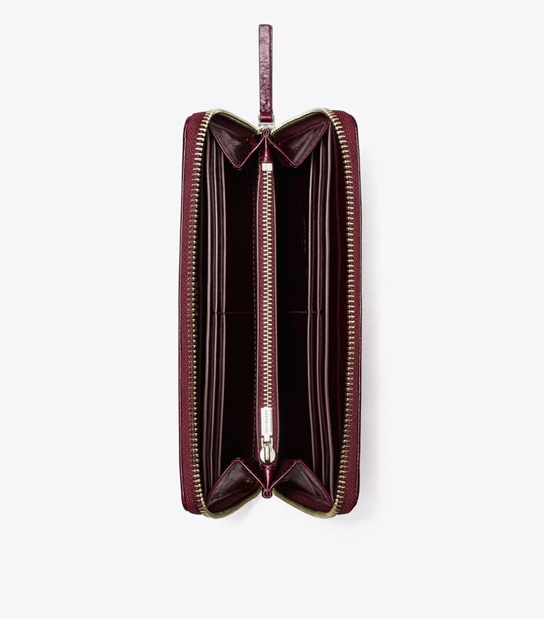 Tory Burch designer portefeuilles Portefeuille continental à glissière Kira matelassé losange effet vieilli dans Dark Carmine vue du dessus