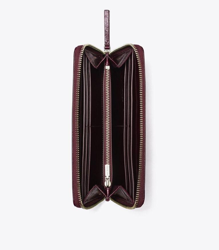 Tory Burch designer portefeuilles Portefeuille continental zippé Kira à matelassage losange vieilli in Dark Carmine angle