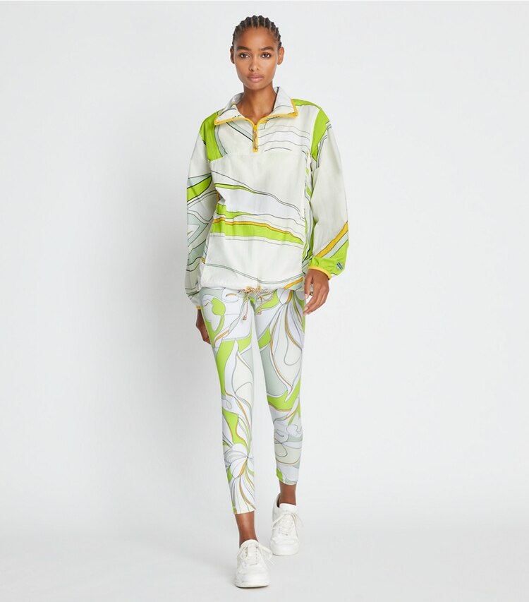 Tory Sport designer jackets Printed Anorak in Chartreuse Twisty Flower on model front