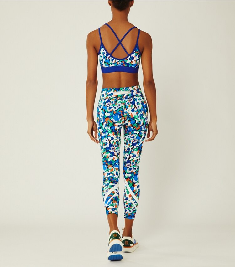 Tory Sport designer bottoms Printed Chevron 7/8 Leggings in Royale Camo Floral on model back