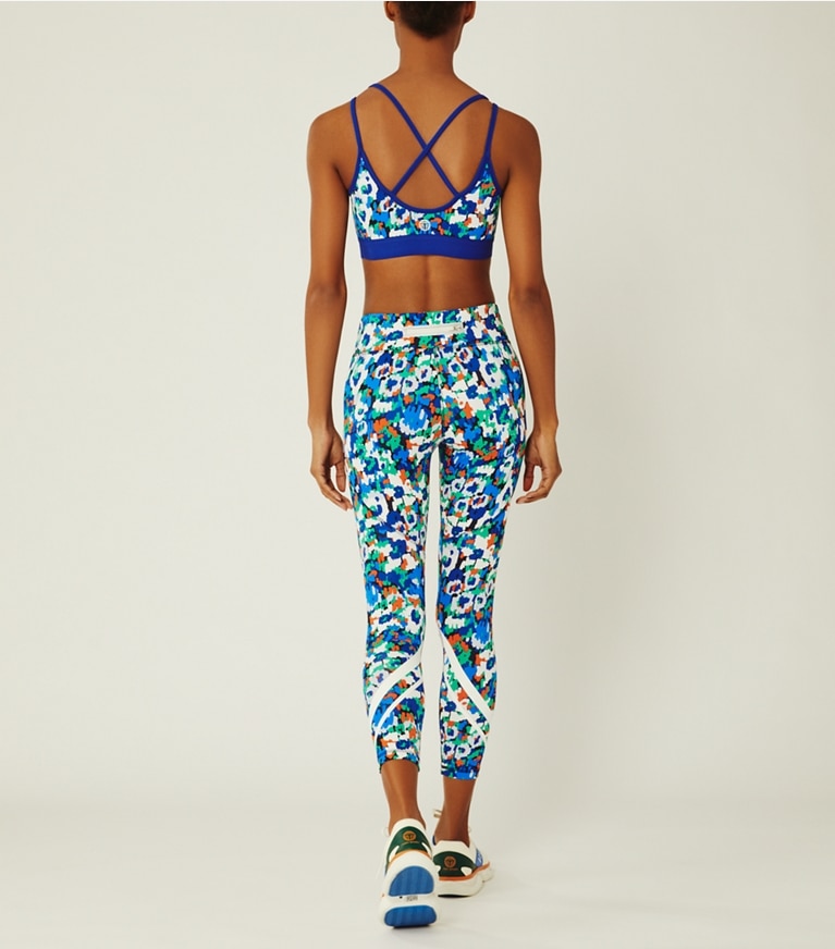 Tory Sport designer bottoms Printed Chevron 7/8 Leggings in Royale Camo Floral front