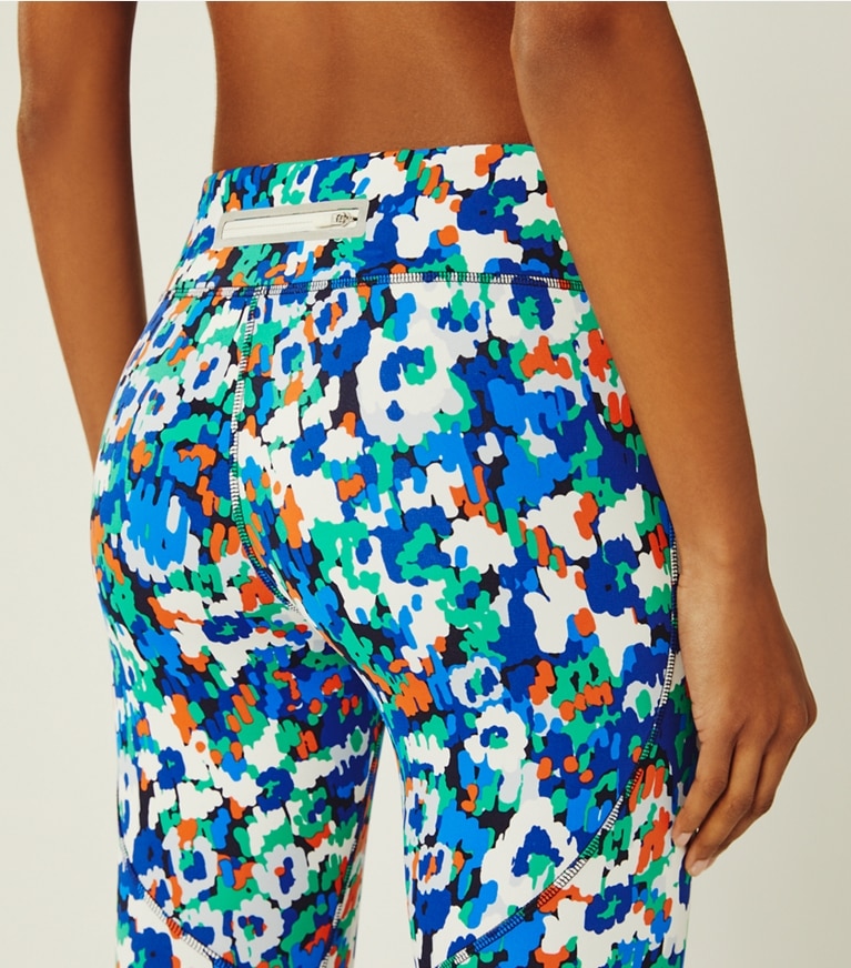 Tory Sport designer bottoms Printed Chevron 7/8 Leggings in Royale Camo Floral front