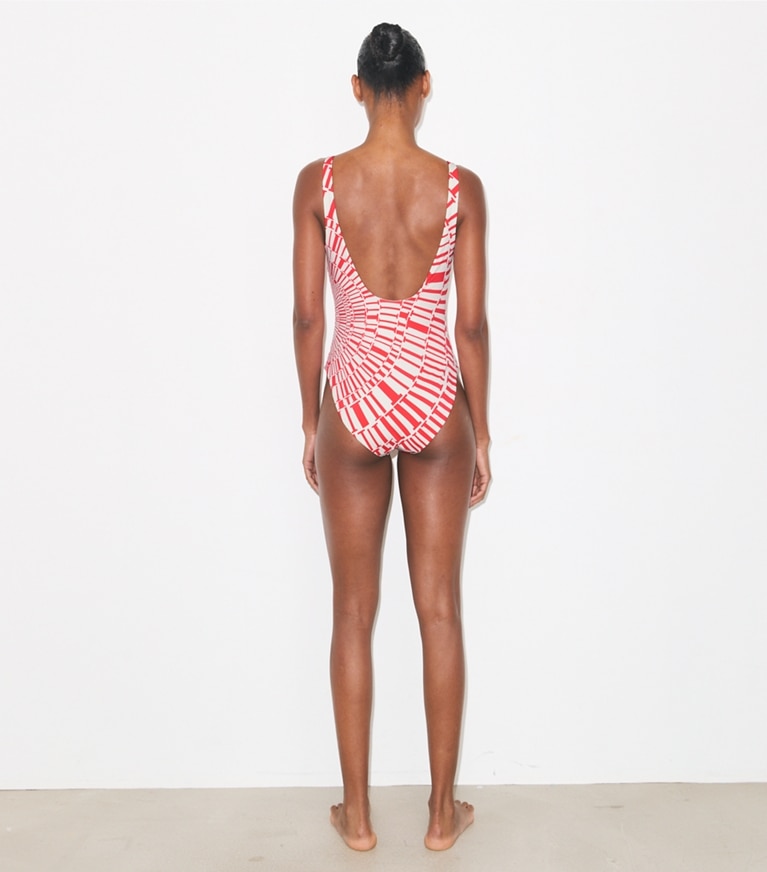 Tory Burch designer one pieces Printed Clip Tank Swimsuit in Red Circle T on model back