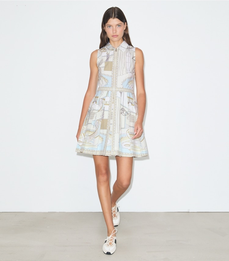 Tory Burch designer dresses Printed Golf Dress in The Pool Beige on model front