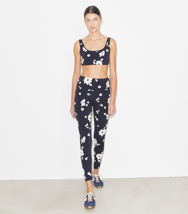 Tory Burch designer bottoms Printed Nylon Legging in Medium Navy Contrast Floral on model front