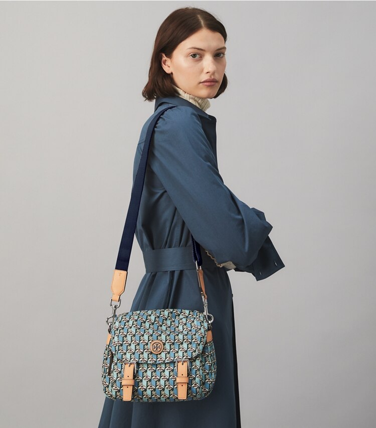 Tory Burch designer crossbody bags Printed Nylon Small Messenger in MISTY BLUE TULIP accessory on model