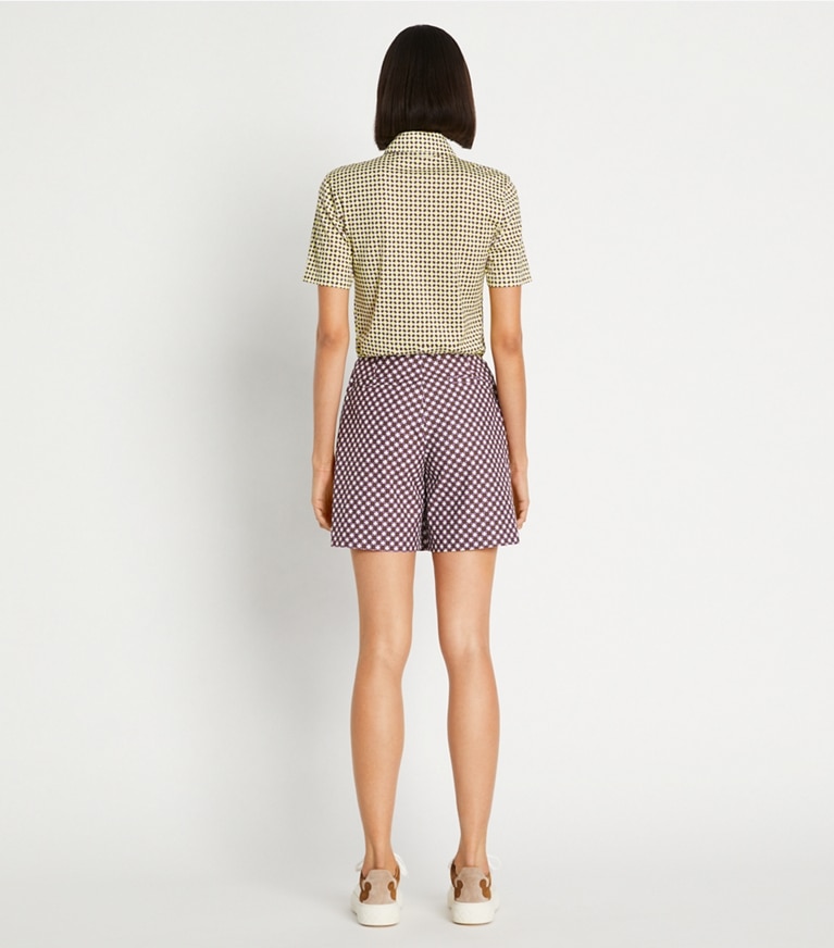 Tory Sport designer bottoms Printed Performance Golf Skort in Mocha Chip Foyer Geo front