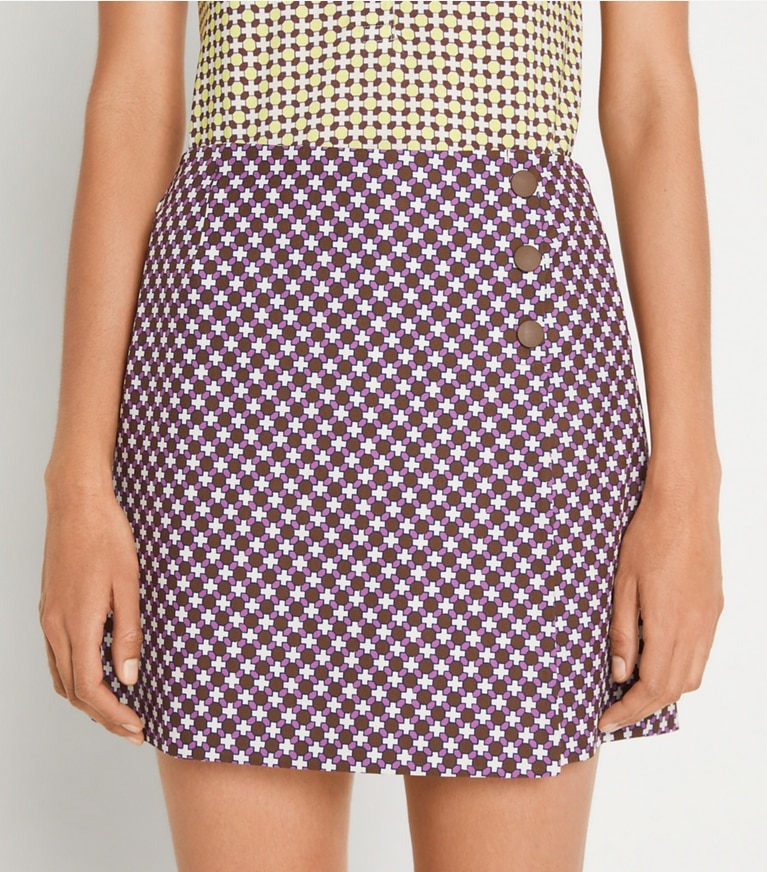 Tory Sport designer bottoms Printed Performance Golf Skort in Mocha Chip Foyer Geo front