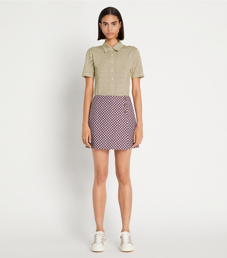 Tory Sport designer bottoms Printed Performance Golf Skort in Mocha Chip Foyer Geo front