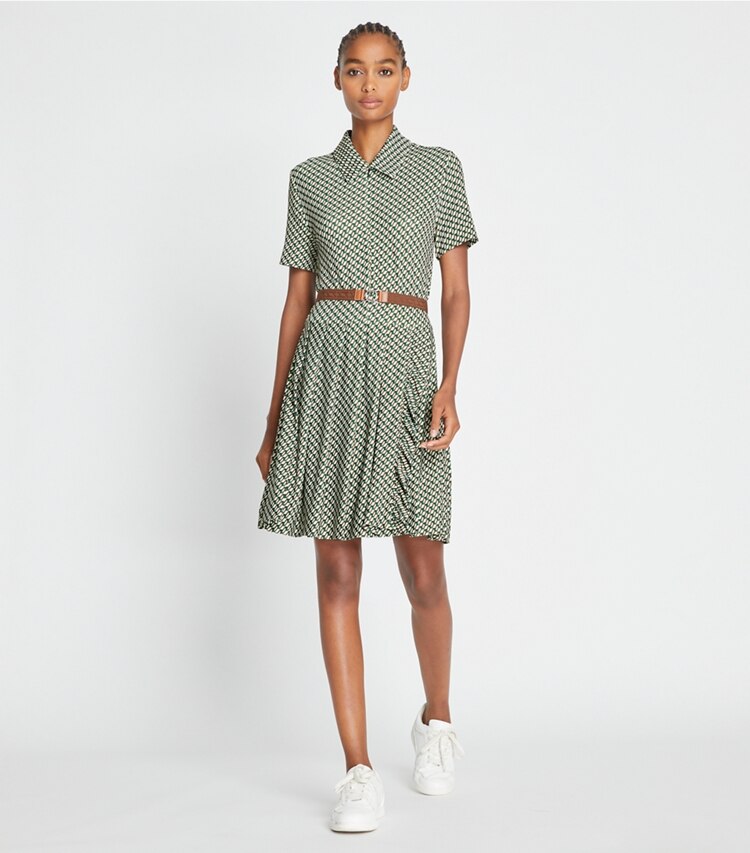 Tory Sport designer dresses Printed Pleated Zip-Front Golf Dress in Mocha Chip Tiled Geo on model front