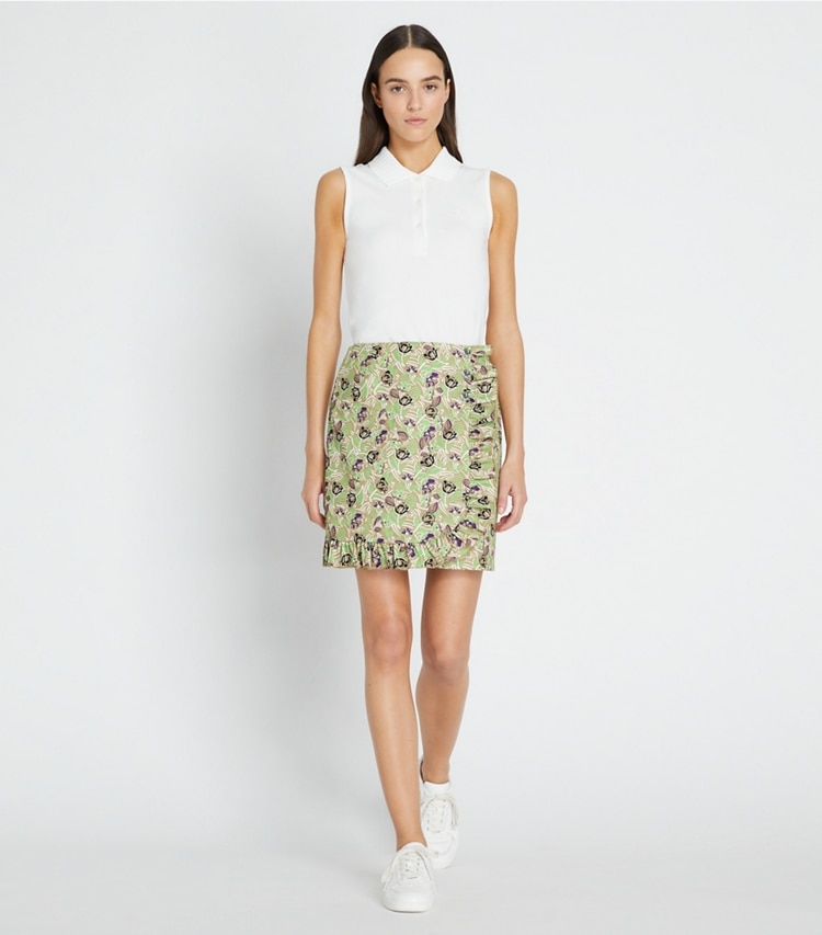 Tory Sport designer bottoms Printed Ruffle Twill Golf Skirt in Green Scribble Floral on model front