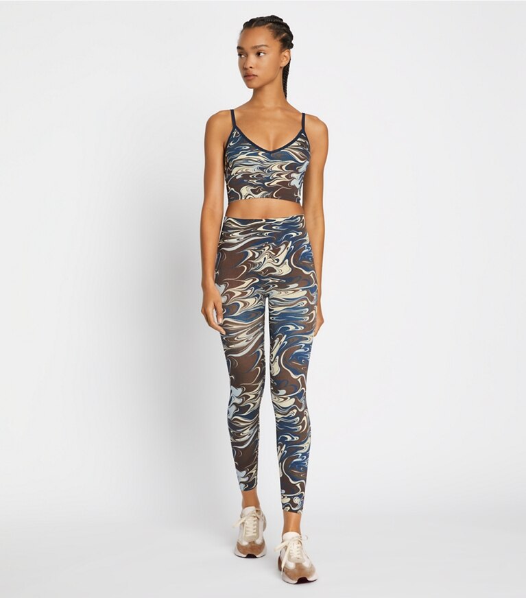 https://s7.toryburch.com/is/image/ToryBurch/style/printed-seamless-7-8-legging-on-model-front.TB_136411_901_20220215_OMFRO.pdp-767x872.jpg