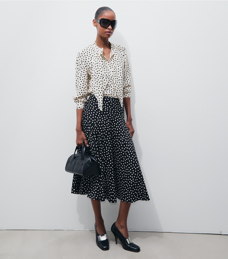 Tory Burch designer tops Printed Silk Bow Blouse in Cream Dot on model front