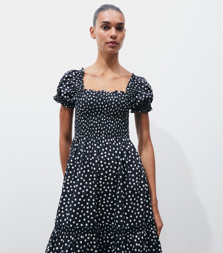Tory Burch designer dresses Printed Smocked Dress in Black Dot on model detail