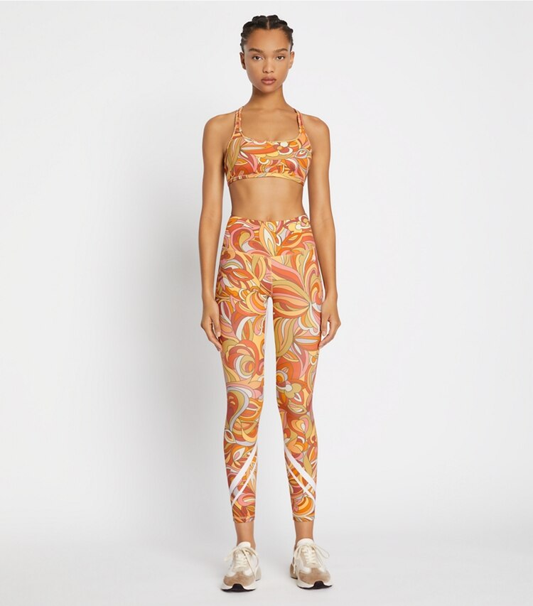Tory Sport designer sports bras Printed Weightless Racerback Bra in Multi Fantasy Floral on model front