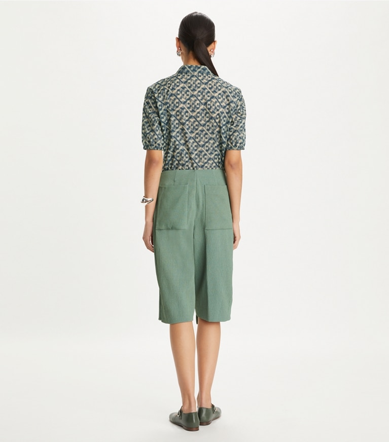 Tory Burch designer tops Prismatic T Monogram Nylon Zip Polo in Smoky Grey Prismatic T Monogram front
