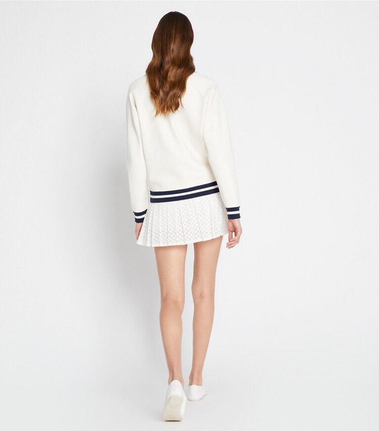 Tory Sport designer sweaters Pull à col V en mérinos in NEW IVORY front