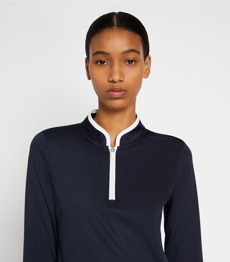 Tory Sport designer hauts Pull à demi-zip performance in Tory Navy on model detail