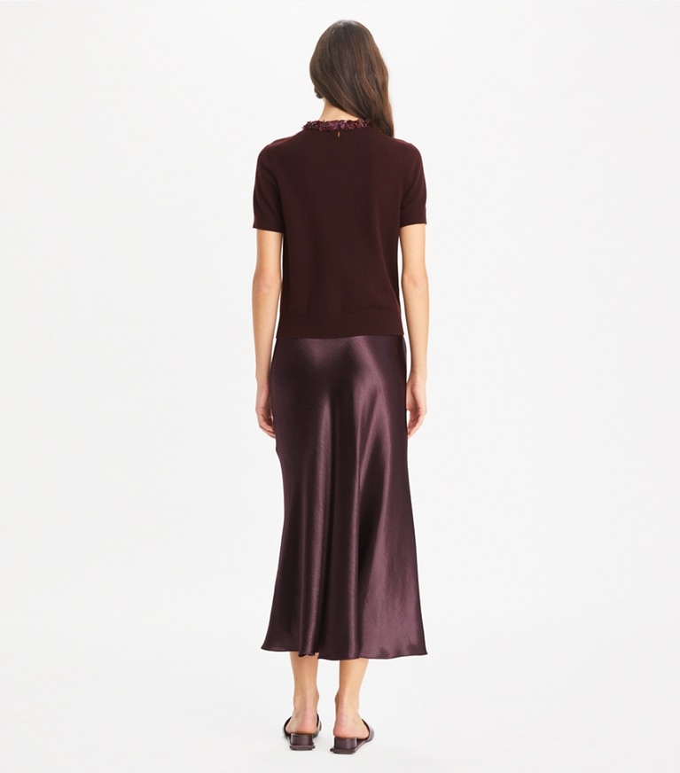 Tory Burch designer sweaters Pull en laine à manches courtes orné de sequins in Dark Winterberry front