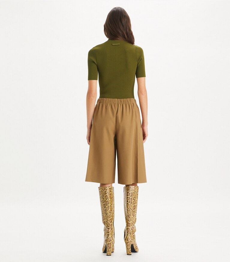 Tory Burch designer sweaters Pull zippé à col rond in Dark Oliva front
