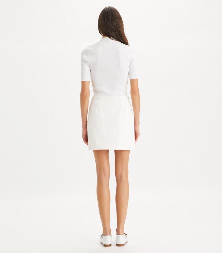 Tory Burch designer sweaters Pull zippé à col rond in White on model back