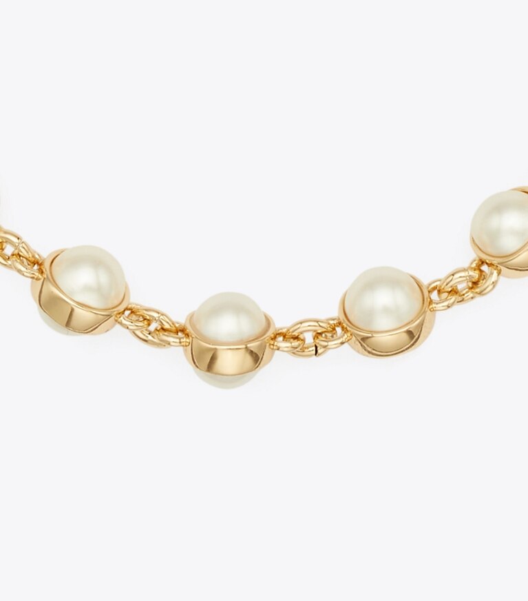 Tory Burch diseñador pulseras Pulsera con perlas Moondance en Light Brass / Ivory detalle