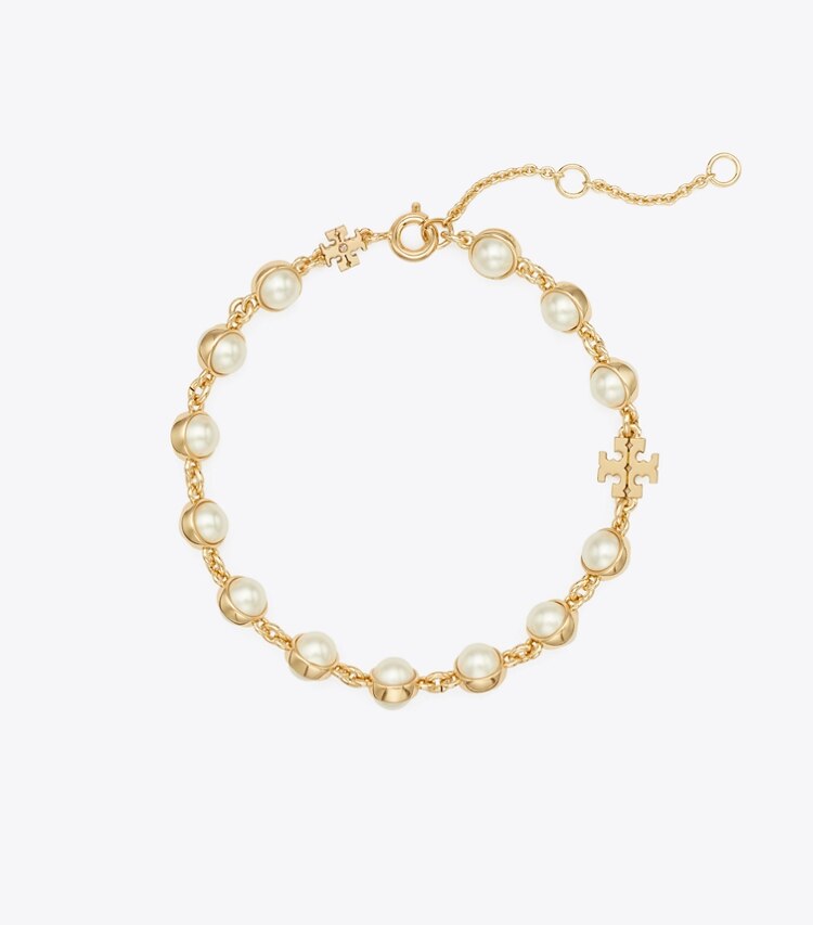 Tory Burch diseñador pulseras Pulsera con perlas Moondance en Light Brass / Ivory frente
