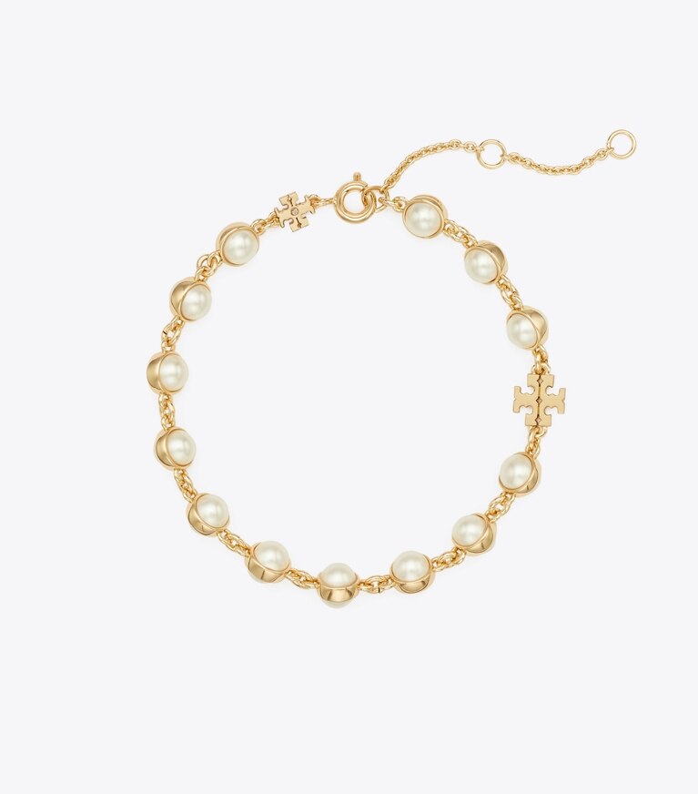 Tory Burch diseñador pulseras Pulsera con perlas Moondance en Light Brass / Ivory frente