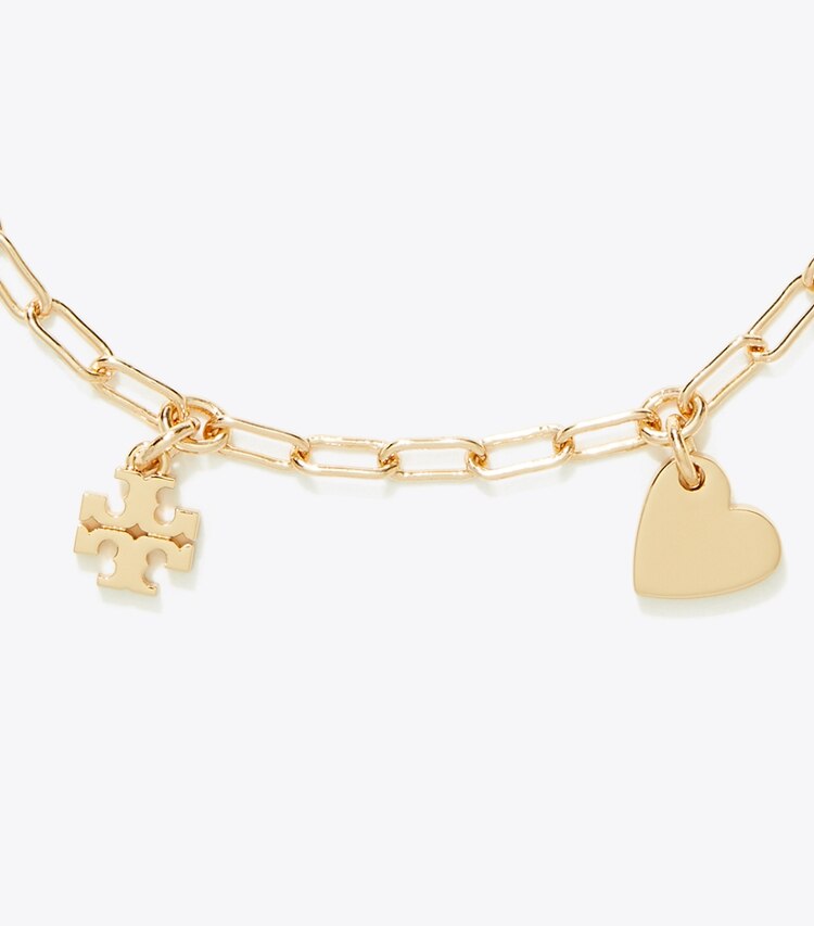 Tory Burch diseñador pulseras Pulsera Curiosity Heart en Tory Gold detalle