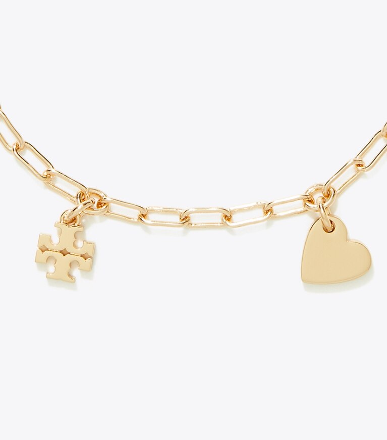Tory Burch diseñador pulseras Pulsera Curiosity Heart en Tory Gold detalle