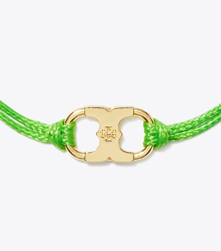Tory Burch diseñador pulseras Pulsera Embrace Ambition en Tory Gold / Green detalle