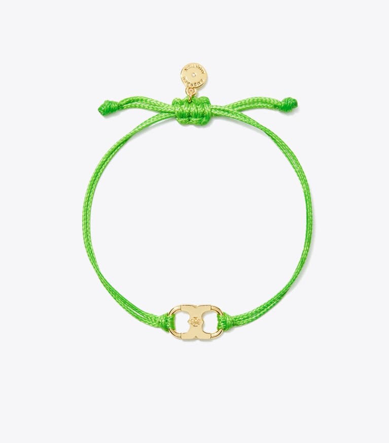 Tory Burch diseñador pulseras Pulsera Embrace Ambition en Tory Gold / Green frente
