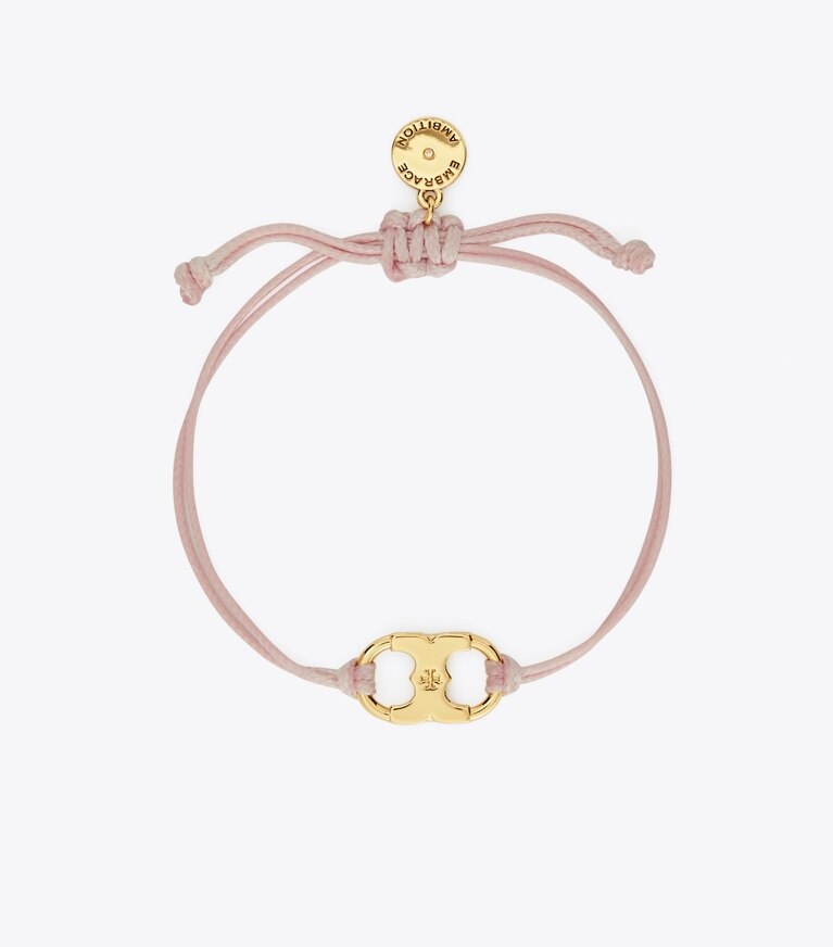 Tory Burch diseñador pulseras Pulsera Embrace Ambition en Tory Gold / Pink frente