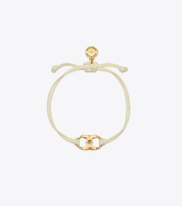 Tory Burch diseñador pulseras Pulsera Embrace Ambition en Tory Gold / Ivory frente