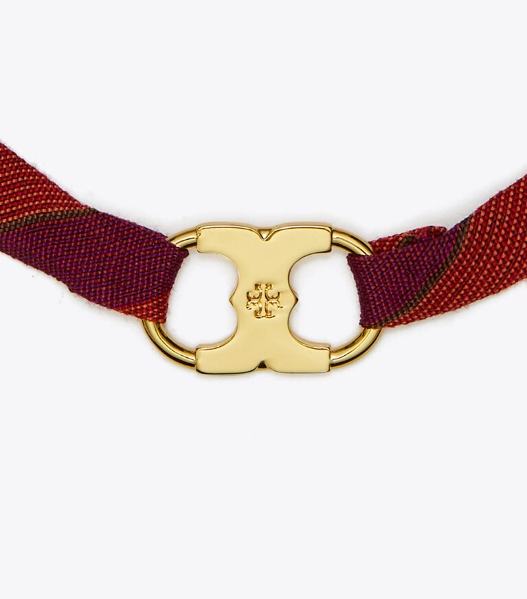 Tory Burch diseñador pulseras Pulsera envolvente Embrace Ambition en Tory Gold / Red / Purple detalle