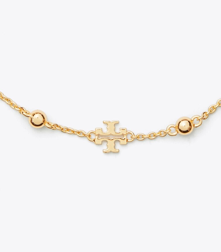 Tory Burch diseñador pulseras Pulsera Kira delicada en Tory Gold detalle