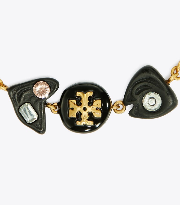 Tory Burch diseñador pulseras Pulsera Roxanne de cristal en Rolled Brass/Matte Black detalle
