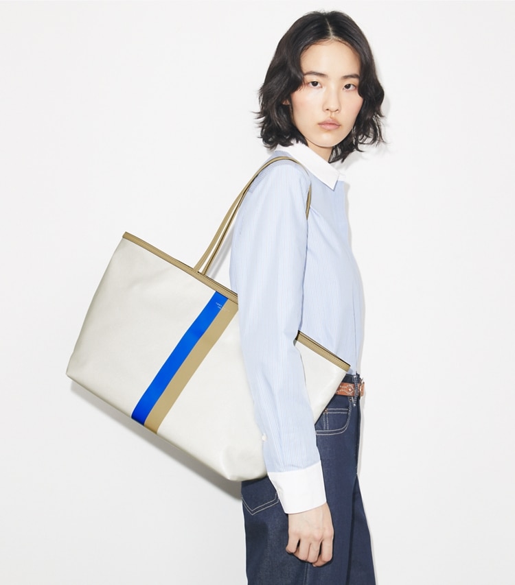 Tory Burch designer tote bags Racer Tote in Bianco accessory on model