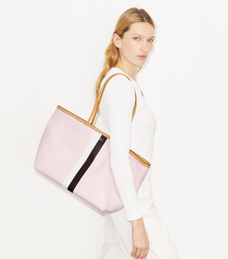Tory Burch designer tote bags Racer Tote in Rose Mist accessory on model