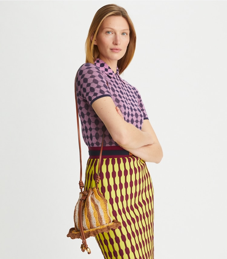 Tory Burch designer crossbody bags Raffia Mushroom Bag in Multi accessory on model