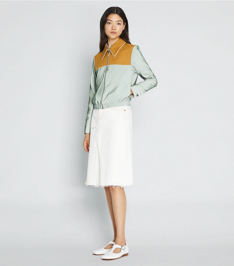 Tory Sport designer jackets Reflective Nylon Jacket in Electric Sage / Ridge on model front