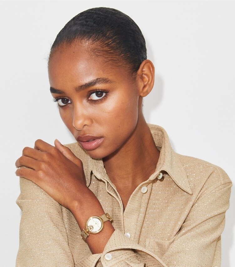 Tory Burch diseñador relojes con correa Reloj pequeño Pierced en IVORY/GOLD accesorio en modelo
