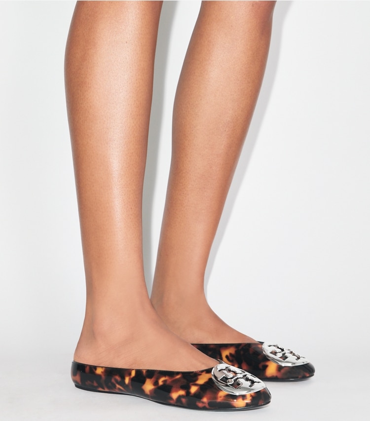 Tory Burch designer flats Reva Ballet Mule in TORTOISE SHELL / GOLD accessory on model